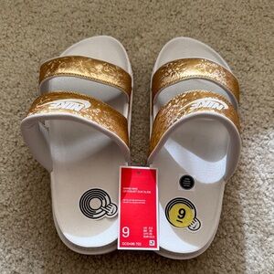 Nike White and Gold Comfort Slides, women’s size 9